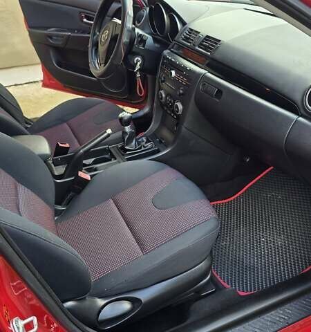 Красный Мазда 3, объемом двигателя 1.6 л и пробегом 205 тыс. км за 4938 $, фото 23 на Automoto.ua