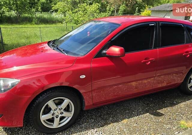 Красный Мазда 3, объемом двигателя 1.6 л и пробегом 205 тыс. км за 4938 $, фото 4 на Automoto.ua