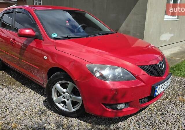 Красный Мазда 3, объемом двигателя 1.6 л и пробегом 205 тыс. км за 4938 $, фото 8 на Automoto.ua