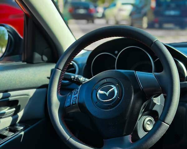 Червоний Мазда 3, об'ємом двигуна 2.3 л та пробігом 165 тис. км за 9000 $, фото 8 на Automoto.ua