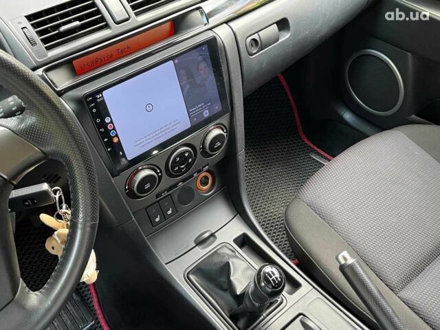 Красный Мазда 3, объемом двигателя 1.6 л и пробегом 279 тыс. км за 4490 $, фото 18 на Automoto.ua