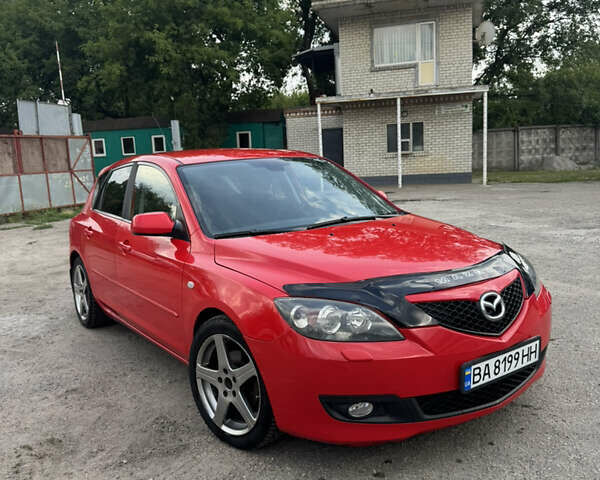 Красный Мазда 3, объемом двигателя 1.6 л и пробегом 220 тыс. км за 5400 $, фото 1 на Automoto.ua