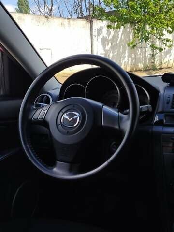 Красный Мазда 3, объемом двигателя 1.6 л и пробегом 133 тыс. км за 6600 $, фото 10 на Automoto.ua