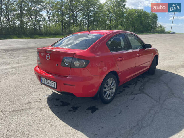 Красный Мазда 3, объемом двигателя 1.6 л и пробегом 214 тыс. км за 4200 $, фото 2 на Automoto.ua