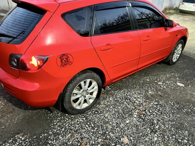 Красный Мазда 3, объемом двигателя 1.6 л и пробегом 149 тыс. км за 6500 $, фото 8 на Automoto.ua