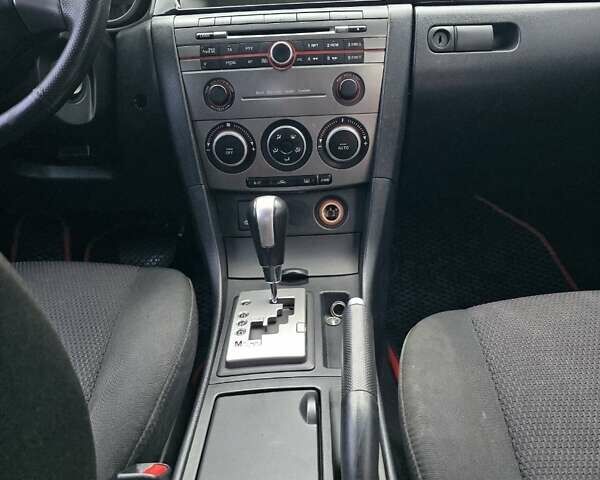 Красный Мазда 3, объемом двигателя 1.6 л и пробегом 222 тыс. км за 4900 $, фото 9 на Automoto.ua