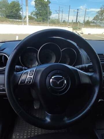 Красный Мазда 3, объемом двигателя 1.6 л и пробегом 133 тыс. км за 6600 $, фото 47 на Automoto.ua