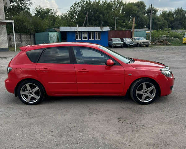 Красный Мазда 3, объемом двигателя 1.6 л и пробегом 220 тыс. км за 5400 $, фото 4 на Automoto.ua