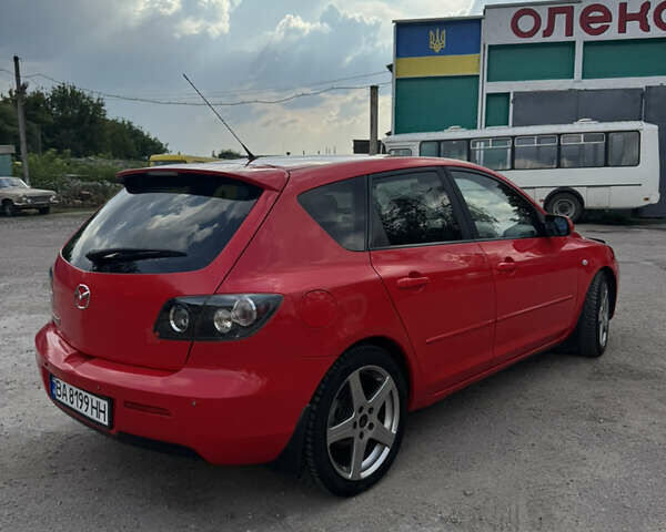 Красный Мазда 3, объемом двигателя 1.6 л и пробегом 220 тыс. км за 5400 $, фото 5 на Automoto.ua