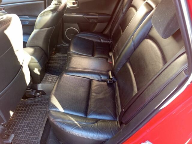 Красный Мазда 3, объемом двигателя 2.3 л и пробегом 215 тыс. км за 4200 $, фото 6 на Automoto.ua