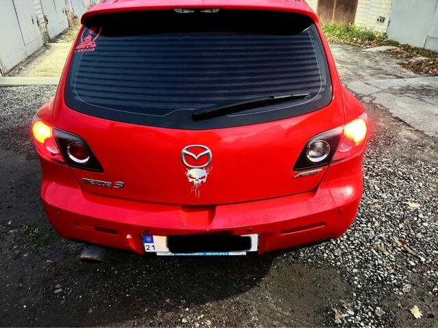 Красный Мазда 3, объемом двигателя 1.6 л и пробегом 149 тыс. км за 6500 $, фото 7 на Automoto.ua