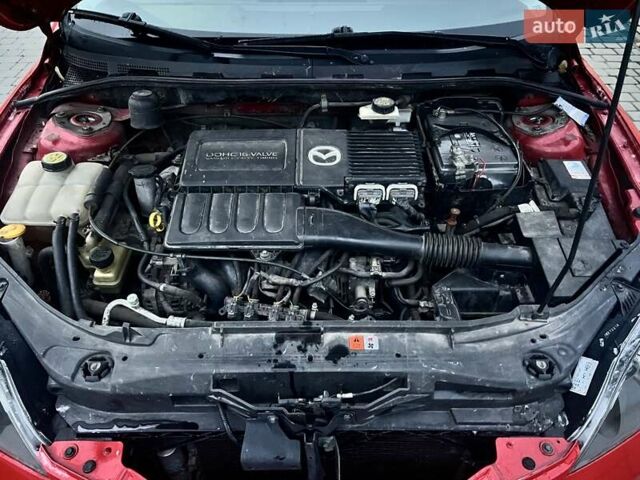 Красный Мазда 3, объемом двигателя 1.6 л и пробегом 138 тыс. км за 6500 $, фото 5 на Automoto.ua