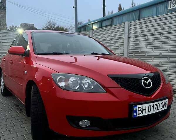 Красный Мазда 3, объемом двигателя 1.6 л и пробегом 138 тыс. км за 6500 $, фото 1 на Automoto.ua