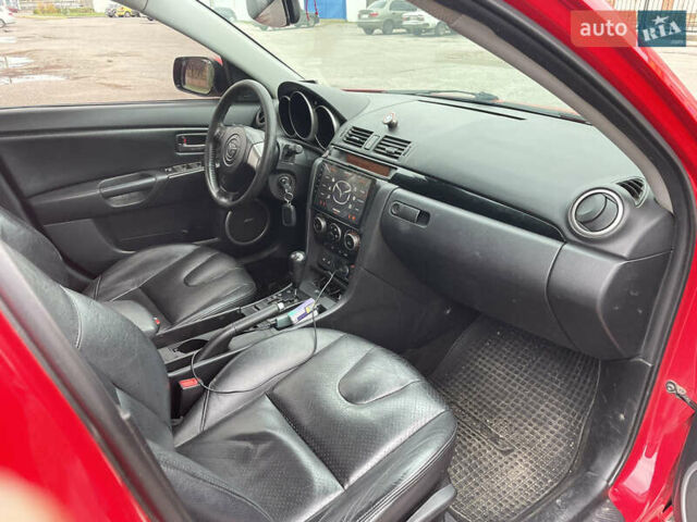 Мазда 3 2007 в Кременчуге на Automoto.ua Красный Мазда 3, объемом двигателя 1.6 л и пробегом 320 тыс. км за 5800 $, фото 10 на Automoto.ua
