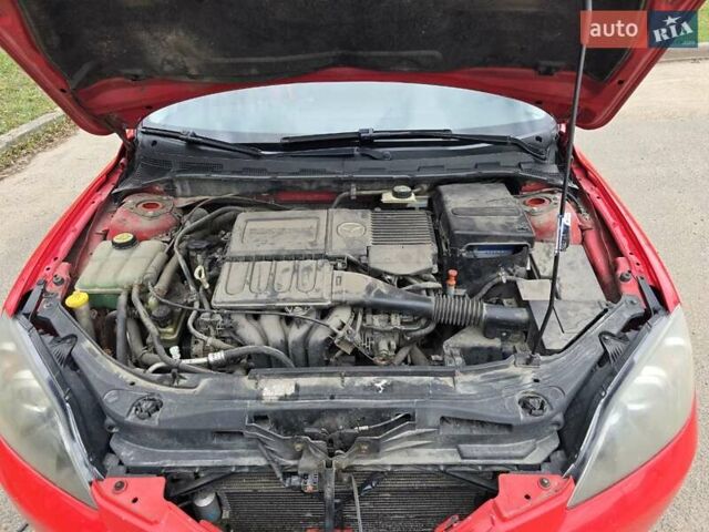 Красный Мазда 3, объемом двигателя 1.6 л и пробегом 222 тыс. км за 4900 $, фото 4 на Automoto.ua