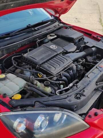 Красный Мазда 3, объемом двигателя 1.6 л и пробегом 133 тыс. км за 6600 $, фото 29 на Automoto.ua