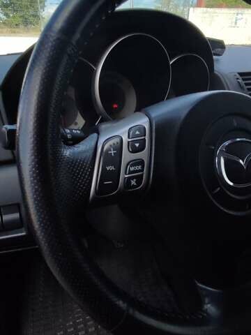 Красный Мазда 3, объемом двигателя 1.6 л и пробегом 133 тыс. км за 6600 $, фото 46 на Automoto.ua