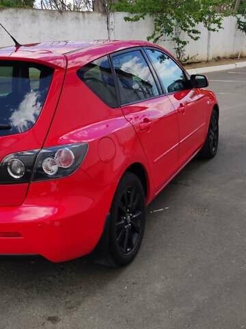 Красный Мазда 3, объемом двигателя 1.6 л и пробегом 133 тыс. км за 6600 $, фото 3 на Automoto.ua