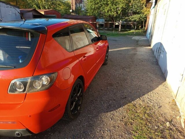Красный Мазда 3, объемом двигателя 2.3 л и пробегом 215 тыс. км за 4200 $, фото 3 на Automoto.ua