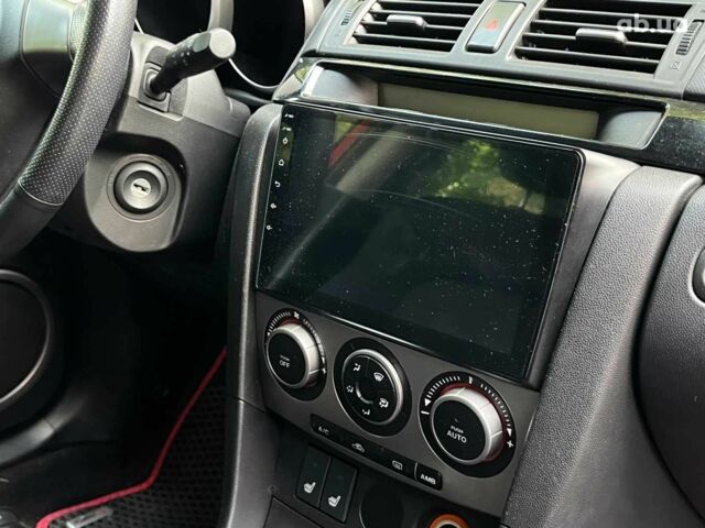 Красный Мазда 3, объемом двигателя 1.6 л и пробегом 279 тыс. км за 4490 $, фото 27 на Automoto.ua