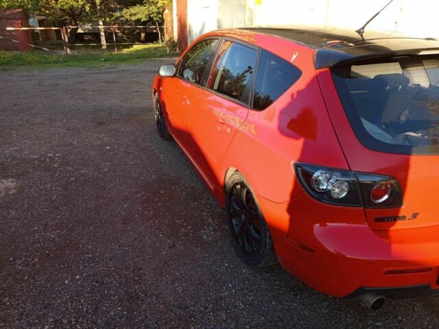 Красный Мазда 3, объемом двигателя 2.3 л и пробегом 215 тыс. км за 4200 $, фото 4 на Automoto.ua