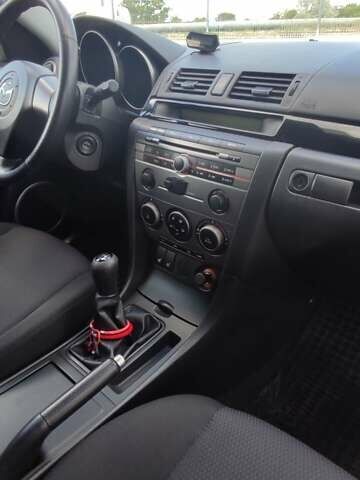 Красный Мазда 3, объемом двигателя 1.6 л и пробегом 133 тыс. км за 6600 $, фото 42 на Automoto.ua