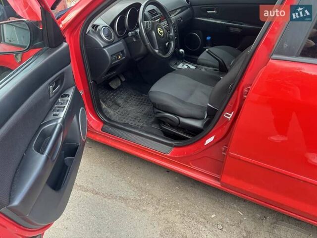 Червоний Мазда 3, об'ємом двигуна 1.6 л та пробігом 234 тис. км за 5500 $, фото 4 на Automoto.ua