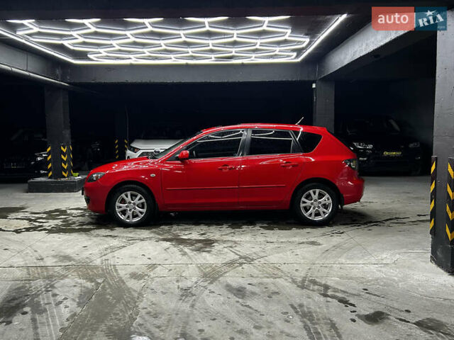 Красный Мазда 3, объемом двигателя 2 л и пробегом 261 тыс. км за 5700 $, фото 3 на Automoto.ua