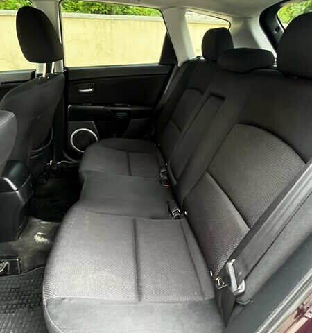 Красный Мазда 3, объемом двигателя 1.6 л и пробегом 146 тыс. км за 6300 $, фото 5 на Automoto.ua