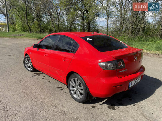 Красный Мазда 3, объемом двигателя 1.6 л и пробегом 214 тыс. км за 4200 $, фото 3 на Automoto.ua
