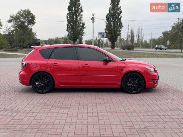 Красный Мазда 3, объемом двигателя 2.3 л и пробегом 194 тыс. км за 8500 $, фото 3 на Automoto.ua