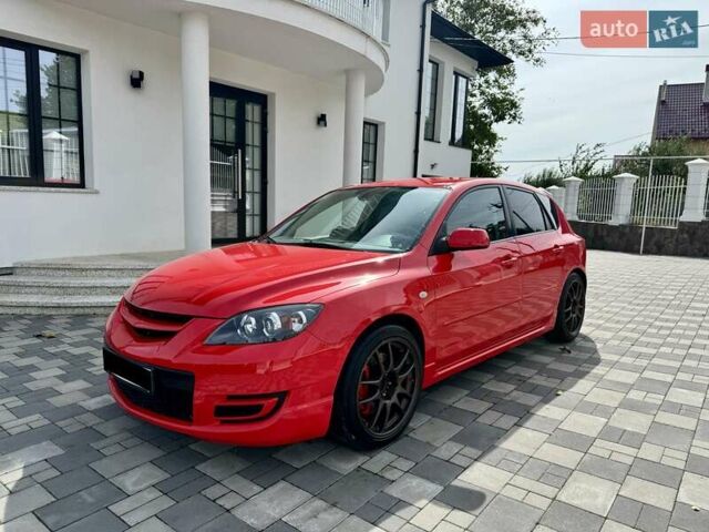 Красный Мазда 3, объемом двигателя 2.3 л и пробегом 103 тыс. км за 9800 $, фото 1 на Automoto.ua