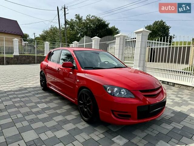 Красный Мазда 3, объемом двигателя 2.3 л и пробегом 103 тыс. км за 9800 $, фото 5 на Automoto.ua