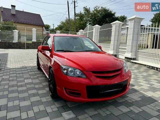 Красный Мазда 3, объемом двигателя 2.3 л и пробегом 103 тыс. км за 9800 $, фото 4 на Automoto.ua