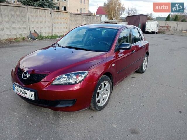 Червоний Мазда 3, об'ємом двигуна 1.35 л та пробігом 173 тис. км за 6200 $, фото 4 на Automoto.ua
