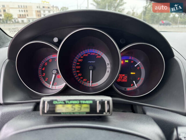 Красный Мазда 3, объемом двигателя 2.3 л и пробегом 194 тыс. км за 8500 $, фото 16 на Automoto.ua