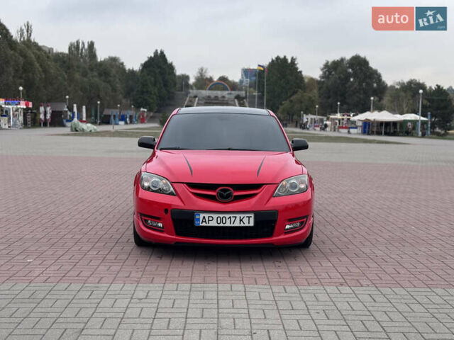 Красный Мазда 3, объемом двигателя 2.3 л и пробегом 194 тыс. км за 8500 $, фото 1 на Automoto.ua