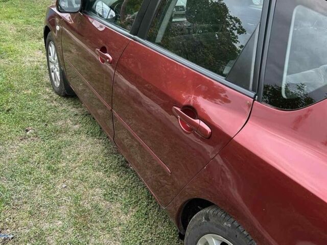 Красный Мазда 3, объемом двигателя 1.6 л и пробегом 120 тыс. км за 6300 $, фото 5 на Automoto.ua