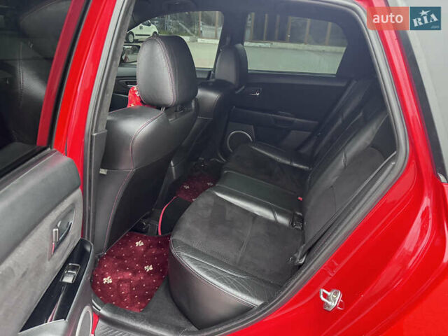 Красный Мазда 3, объемом двигателя 2.3 л и пробегом 194 тыс. км за 8500 $, фото 18 на Automoto.ua