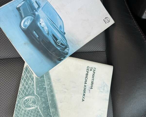 Красный Мазда 3, объемом двигателя 2.3 л и пробегом 103 тыс. км за 9800 $, фото 47 на Automoto.ua