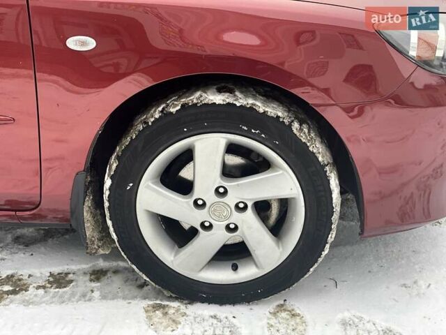 Червоний Мазда 3, об'ємом двигуна 1.6 л та пробігом 167 тис. км за 6000 $, фото 7 на Automoto.ua