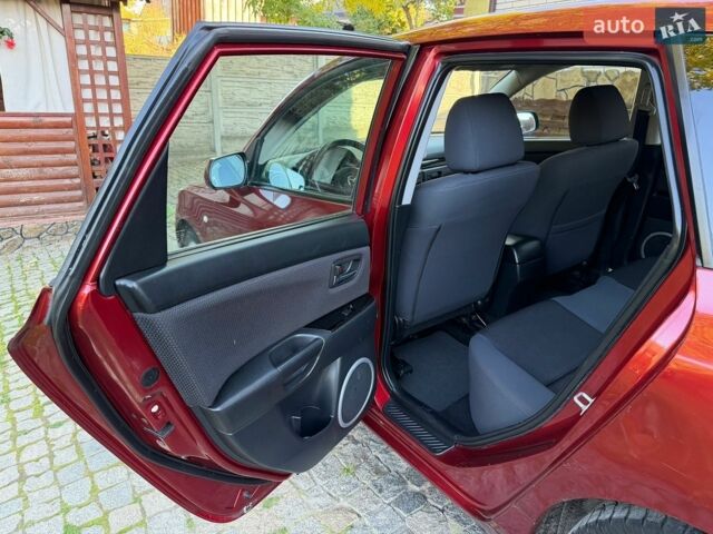 Красный Мазда 3, объемом двигателя 1.6 л и пробегом 95 тыс. км за 4200 $, фото 9 на Automoto.ua