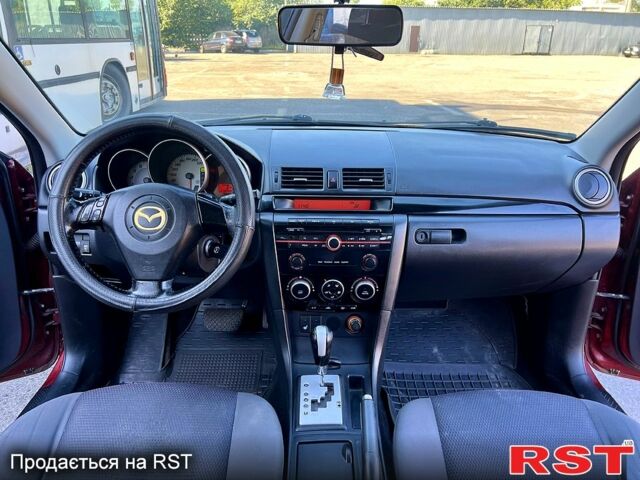 Красный Мазда 3, объемом двигателя 1.6 л и пробегом 222 тыс. км за 4550 $, фото 4 на Automoto.ua
