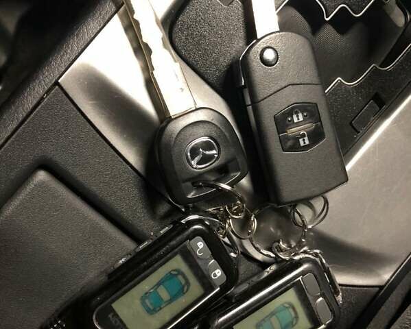 Красный Мазда 3, объемом двигателя 1.6 л и пробегом 122 тыс. км за 8250 $, фото 12 на Automoto.ua