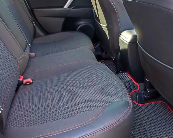 Красный Мазда 3, объемом двигателя 1.6 л и пробегом 192 тыс. км за 7300 $, фото 1 на Automoto.ua