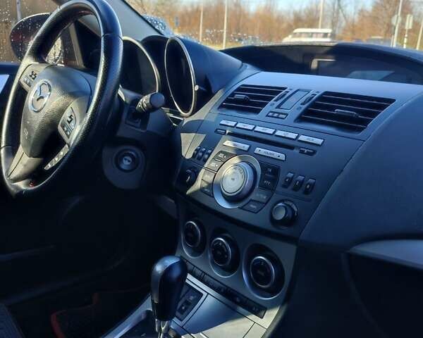 Красный Мазда 3, объемом двигателя 1.6 л и пробегом 192 тыс. км за 7300 $, фото 2 на Automoto.ua