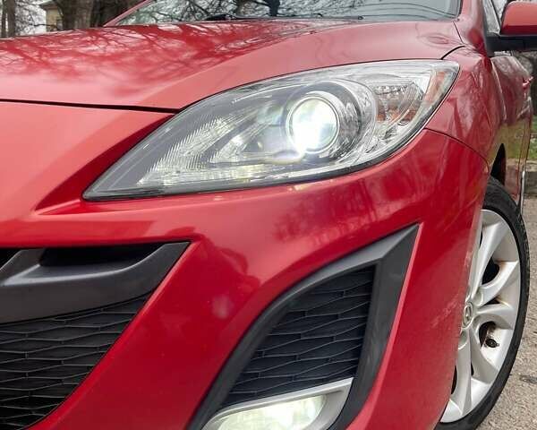 Красный Мазда 3, объемом двигателя 2.49 л и пробегом 180 тыс. км за 8700 $, фото 3 на Automoto.ua