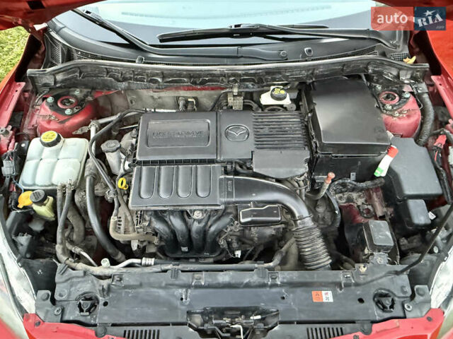 Красный Мазда 3, объемом двигателя 1.6 л и пробегом 51 тыс. км за 9800 $, фото 24 на Automoto.ua
