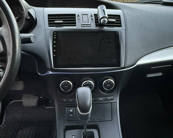 Красный Мазда 3, объемом двигателя 1.6 л и пробегом 51 тыс. км за 9800 $, фото 10 на Automoto.ua