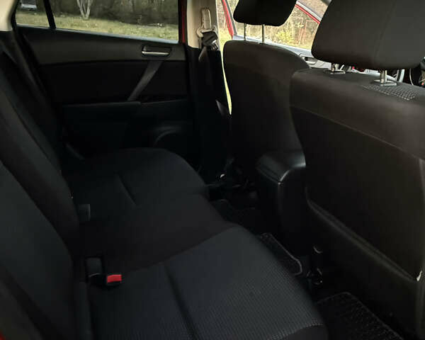 Красный Мазда 3, объемом двигателя 1.6 л и пробегом 51 тыс. км за 9800 $, фото 17 на Automoto.ua